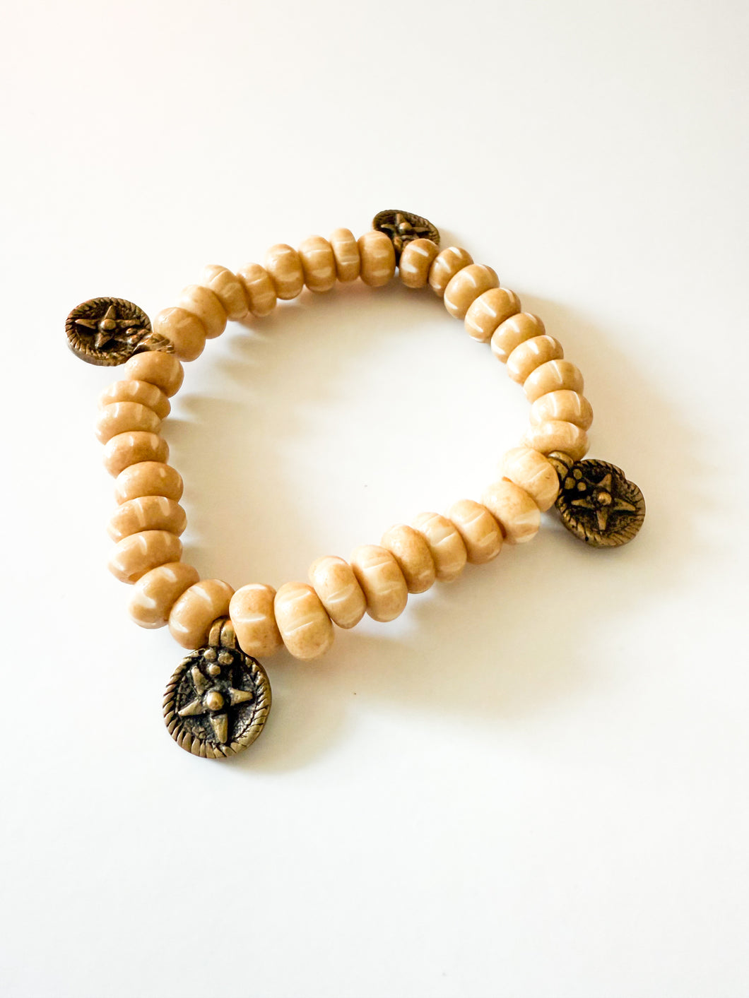 Tan Bone and Star Brass Charm Bracelet