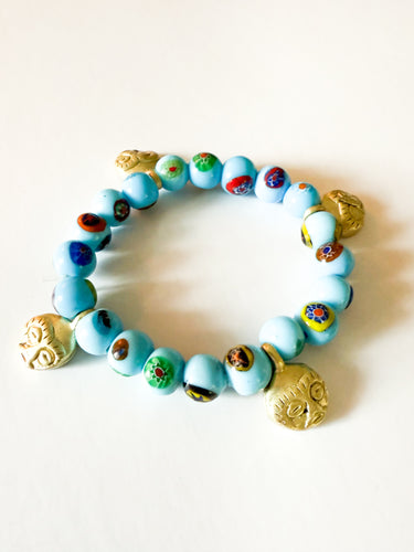 Turquoise Glass with Brass Faces Charm Bracelet